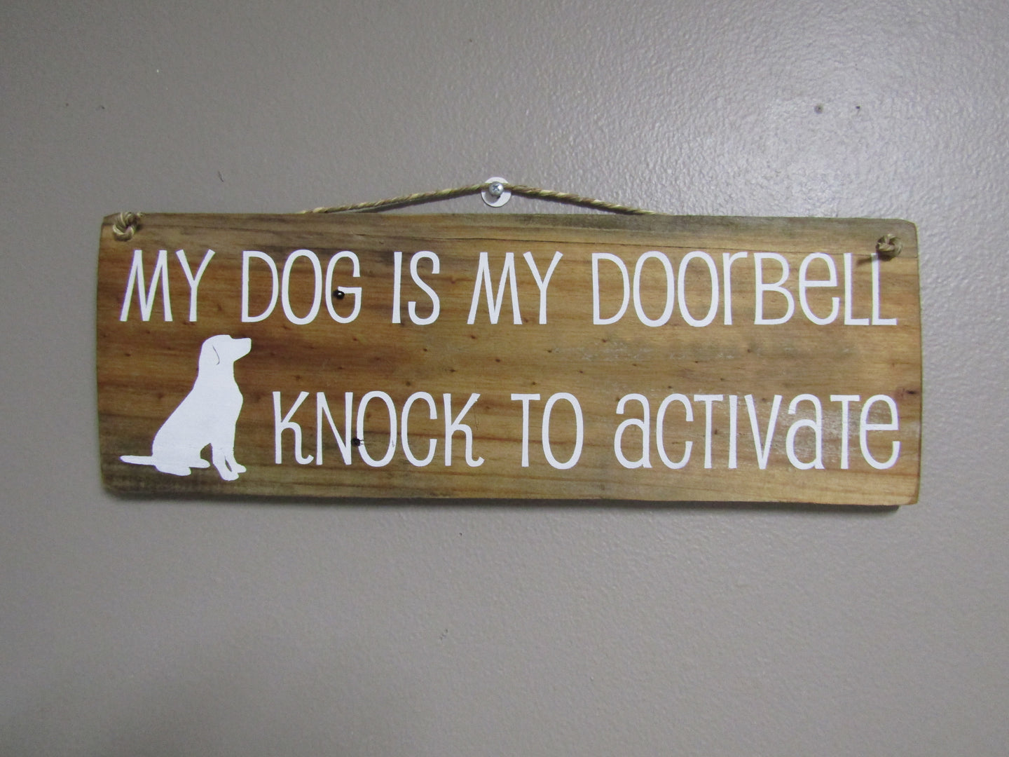 My dog is my doorbell, natural stain lab